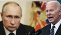 Joe Bidenas kalba, o fone matomas Vladimiro Putino atvaizdas (nuotr. SCANPIX)