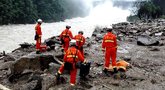 Kinijoje po žemės nuošliauža yra dingę 34 darbininkai (nuotr. SCANPIX)