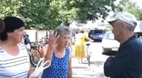 „Tu ką, idiotas?“: ukrainietės kaip reikiant atkirto Lukašenkos fanui (nuotr. stop kadras)