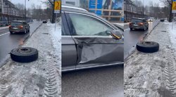 Paupio gatvėje Vilniuje sunkvežimio ratas suniokojo automobilį (nuotr. tv3.lt)