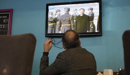 Xi Jinpingas, regimas televizoriaus ekrane  (nuotr. SCANPIX)