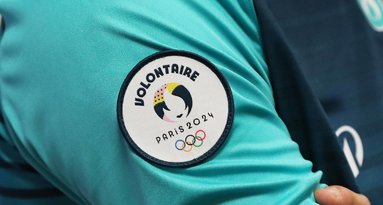 Paryžiaus olimpinių žaidynių savanoriai (nuotr. SCANPIX)