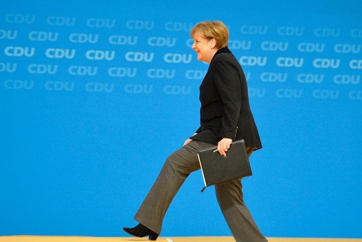 Angela Merkel pažadėjo sumažinti pabėgėlių antplūdį (nuotr. SCANPIX)