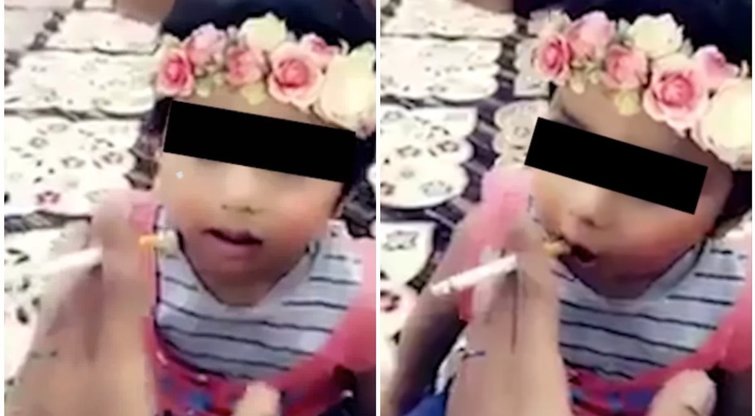 Siaubingas tėvo auklėjimas šokiruoja: vos 2 metų dukrelę mokė rūkyti (nuotr. YouTube)