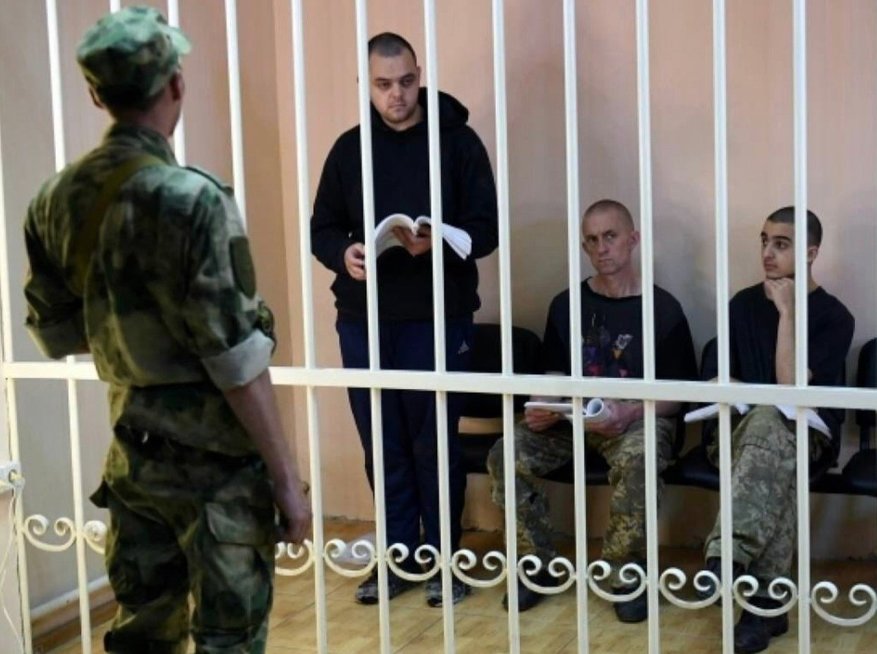 Prorusiški separatistai mirties bausme nuteisė užsienio piliečius, kovojusius Ukrainos pusėje (nuotr. stop kadras)
