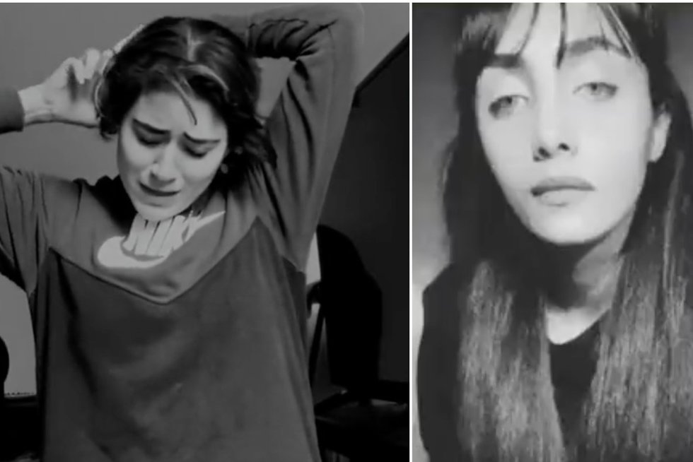 Pamatykite: vis daugiau protestuojančių iraniečių moterų nusikerpa plaukus (nuotr. stop kadras)